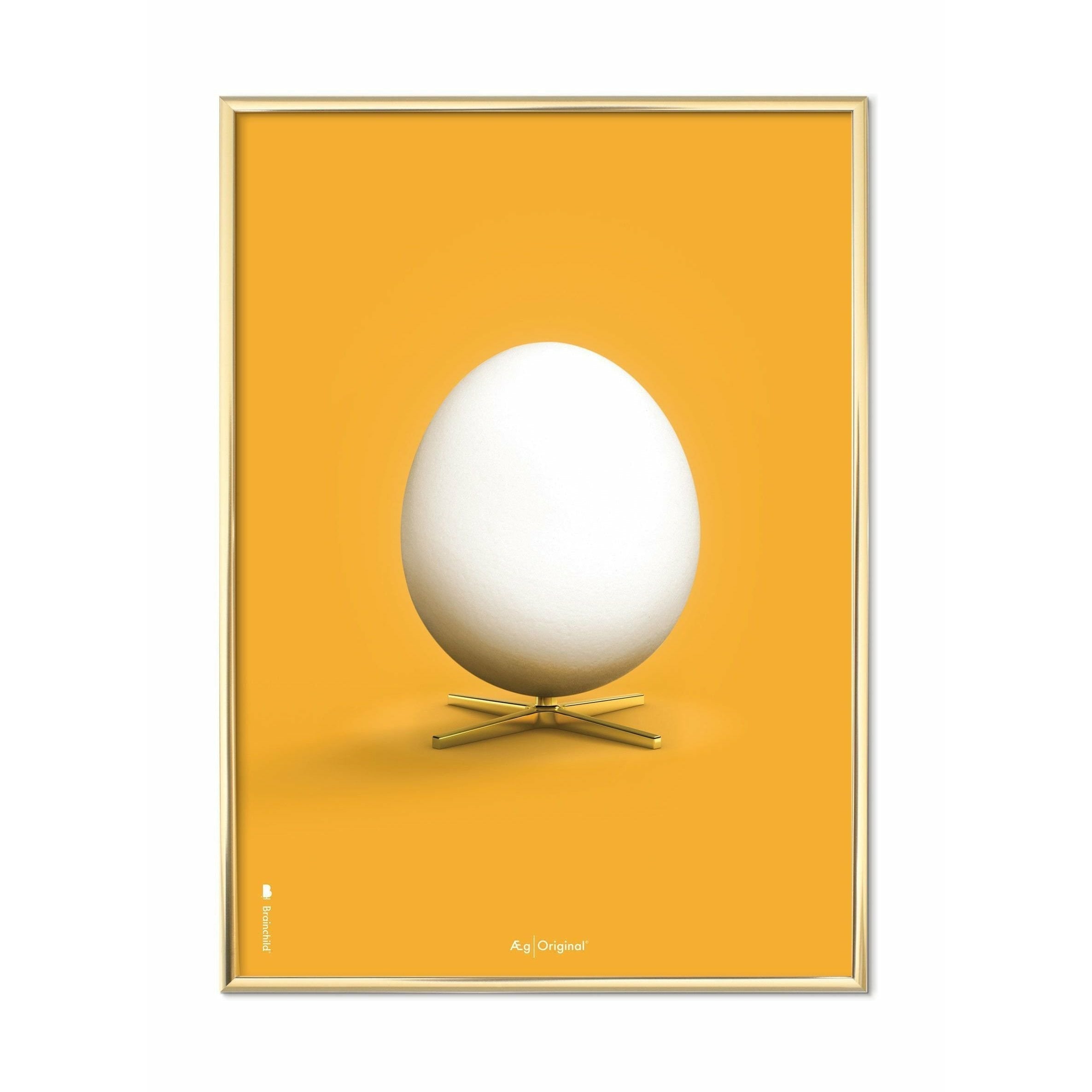 Brainchild Egg Classic Affisch, mässingsfärgad ram 50x70 cm, gul bakgrund