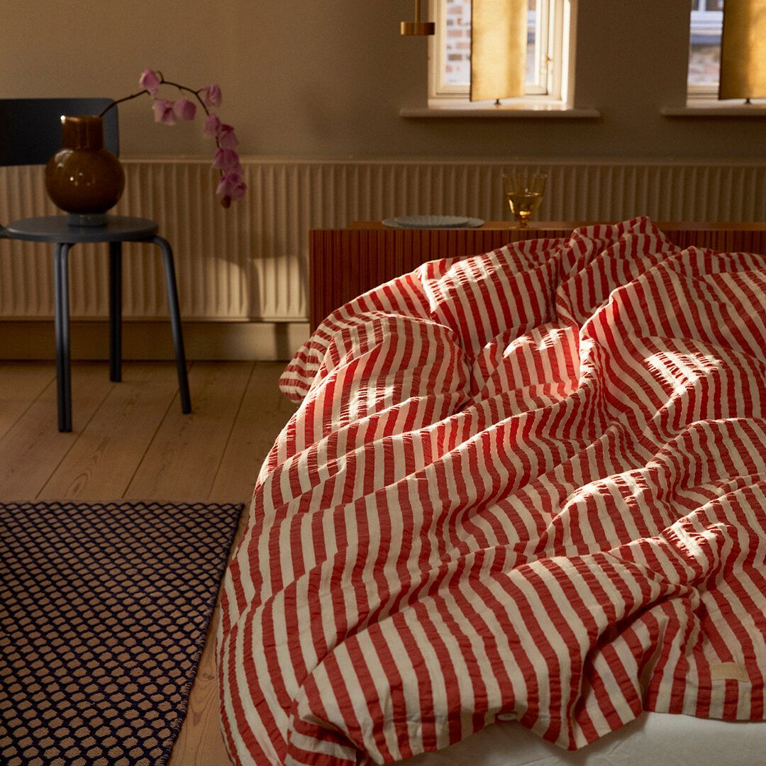 Juna Bæk & Wave Lines sängkläder 140x220 cm, chili/björk