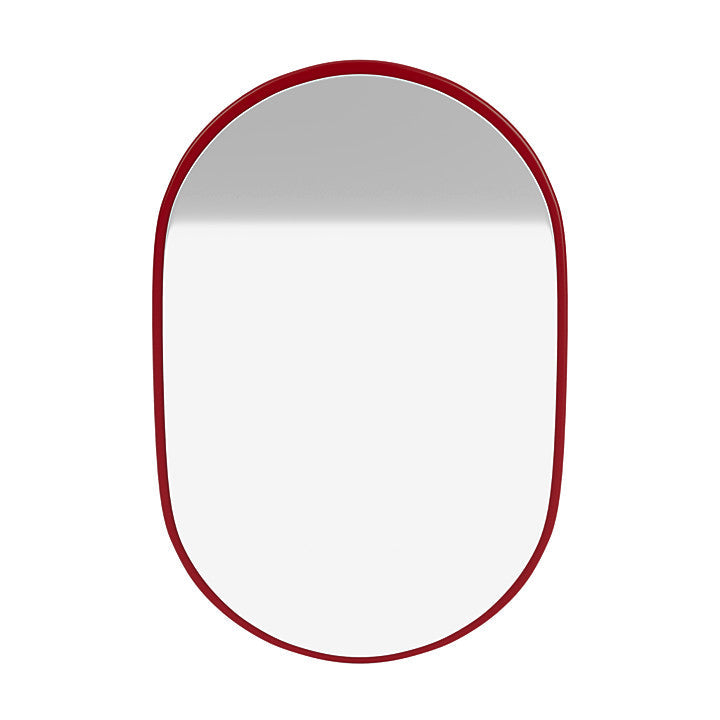 Montana ser liten oval spegel med upphängningsfästen, rödbetor röd