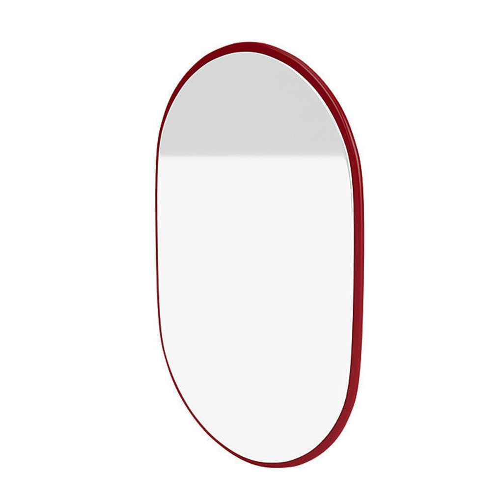 Montana ser liten oval spegel med upphängningsfästen, rödbetor röd
